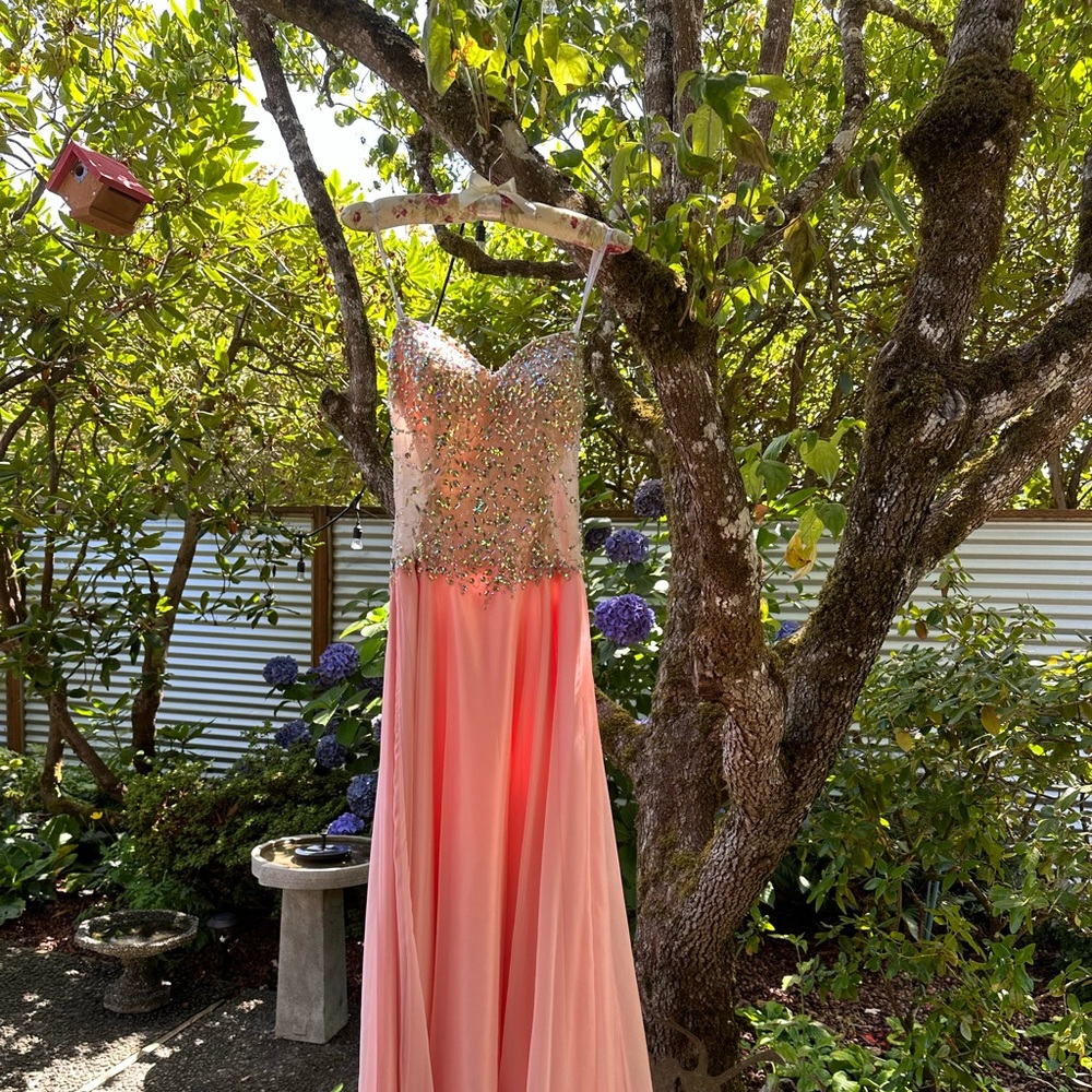 Gorgeous special occasion dress. Worn 1x. Minor snag/beading. Peachy-pink. XS.